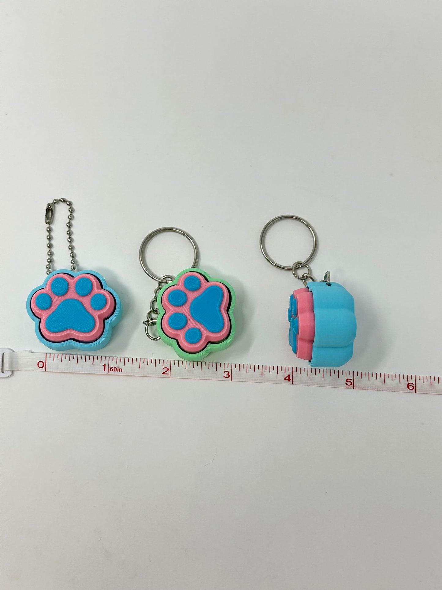 Cat and Dog Paw Clicker Keychains