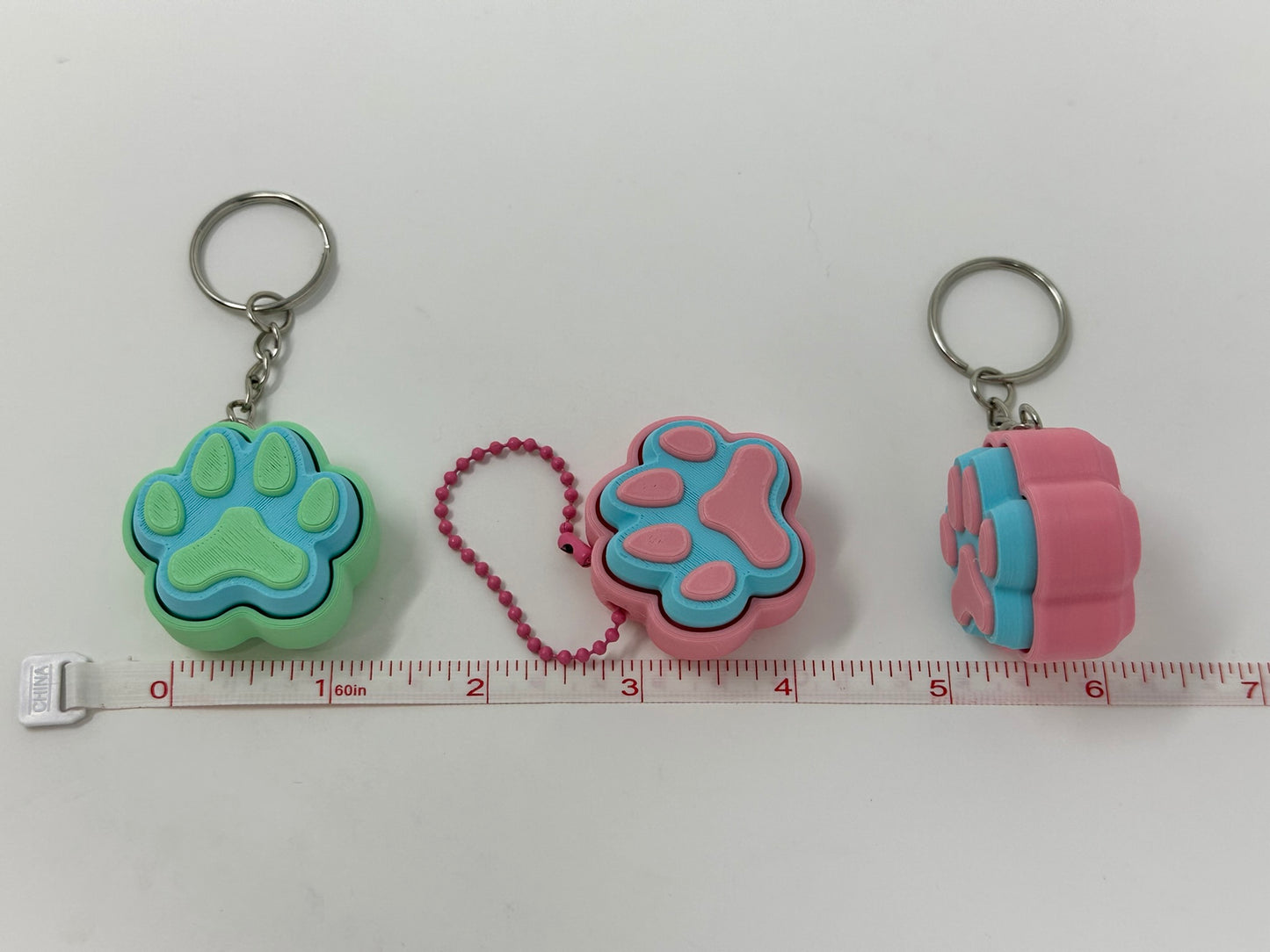 Cat and Dog Paw Clicker Keychains