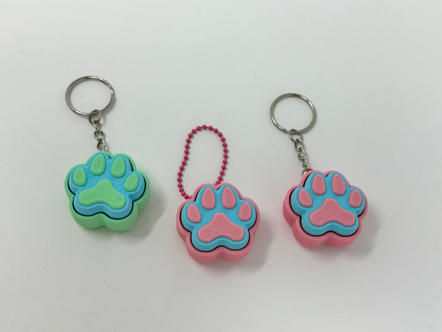 Cat and Dog Paw Clicker Keychains