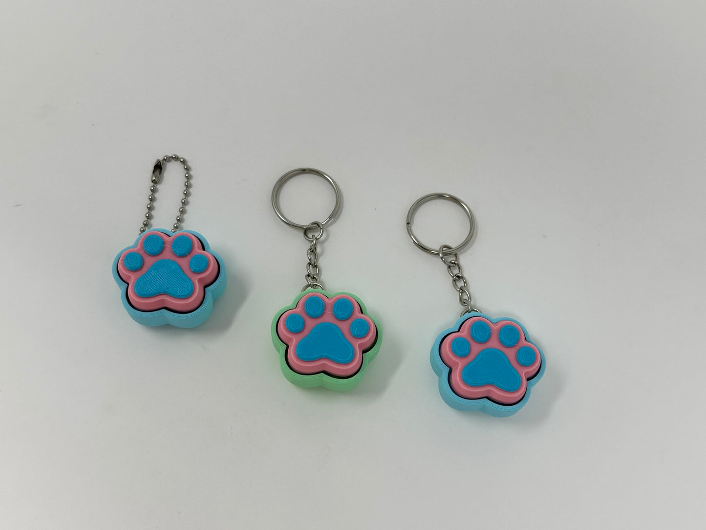 Cat and Dog Paw Clicker Keychains